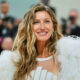 Gisele posng in white
