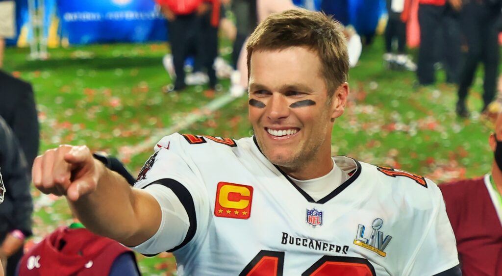 Tom Brady points while celebrating his Super Bowl win.