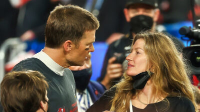 Tom Brady speaking to Gisele Bundchen