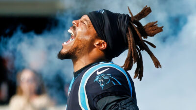 Cam Newton yelling while in uniform