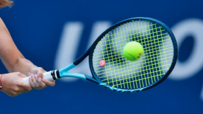 Simona Halep's hands around a tennis racket