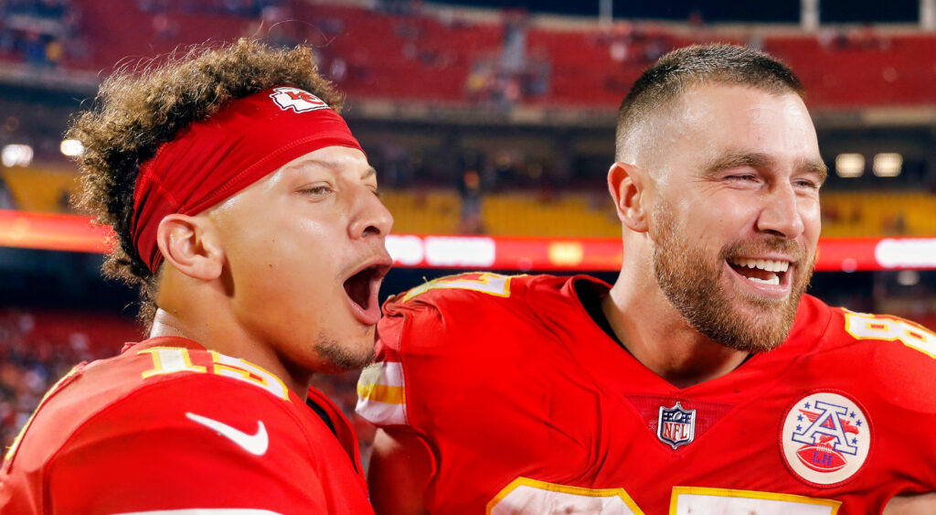 Kansas City Chiefs quarterback Patrick Mahomes (left) smiling with tight end Travis Kelce (right).