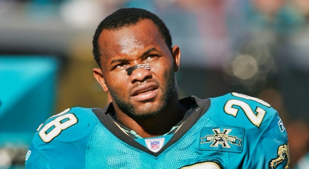 Fred Taylor looks on during a game without his helmeet.