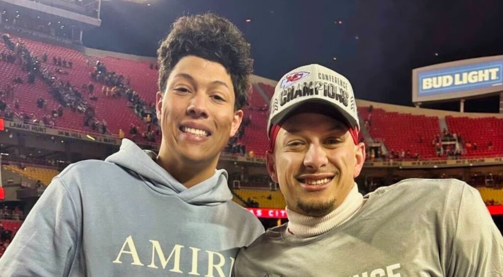 Patrick and Jackson Mahomes pose together following a game.