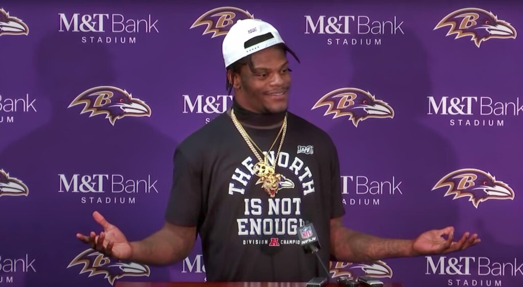 Lamar Jackson speaks at a press conference.