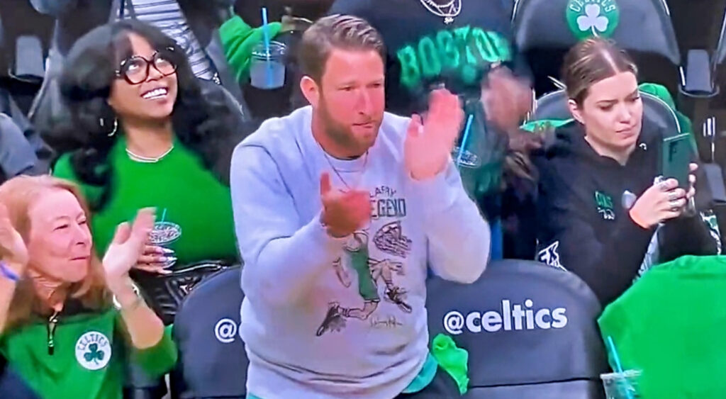 Barstool Sports founder Dave Portnoy clapping at Philadelphia 76ers-Boston Celtics game.