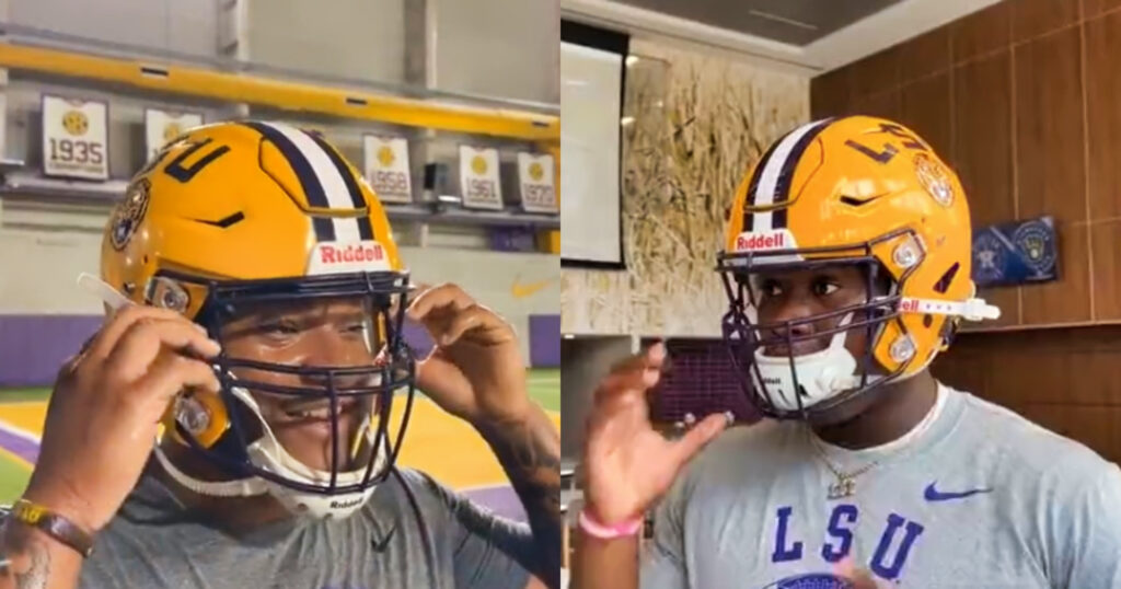 LSU players trying on helmets