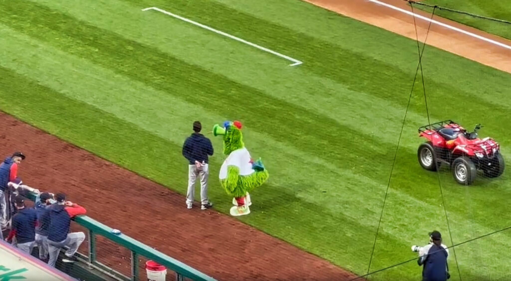 Pitcher standing with mascot