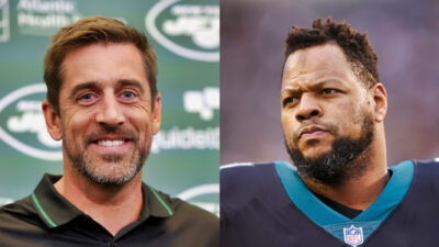 Ndamukong Suh in Eagles jersey. Aaron Rodgers smiling