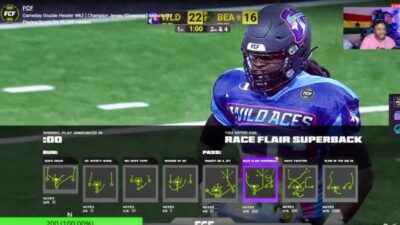 Fan Controlled Football League player on field with plays on screen
