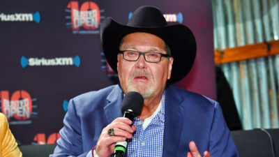 Jim Ross speaking into a mic