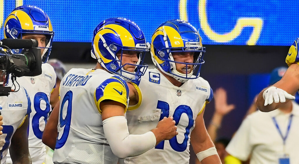 Los Angeles Rams' quarterback Matthew Stafford (left) celebrating a touchdown with Cooper Kupp (right).