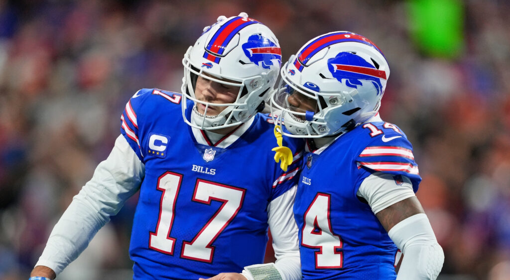 Josh Allen (left) and Stefon Diggs (right) celebrating after a touchdown.