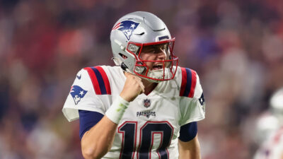 Mac Jones pumming a fist