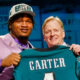 Jalen carter holding jersey with Roger Goodell