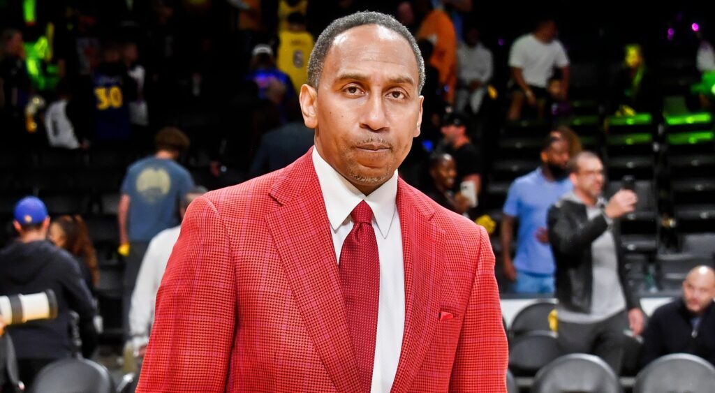 Stephen A. Smith looks on before a Lakers game.