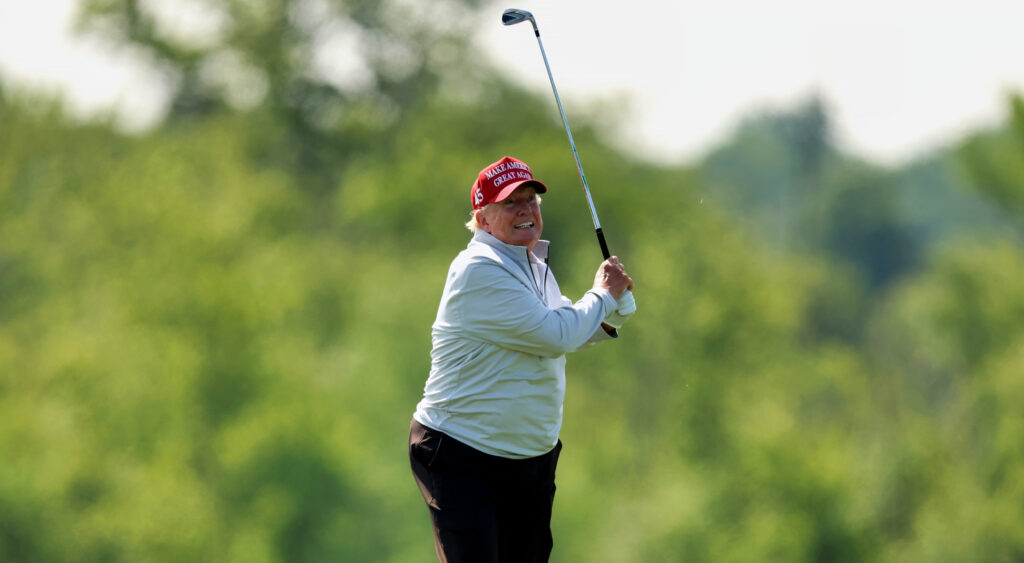 Donald Trump holding a golf club