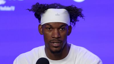 Jimmy Butler speaking to reporters