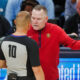 Nuggets head coach Mike Malone arguing with NBA referee