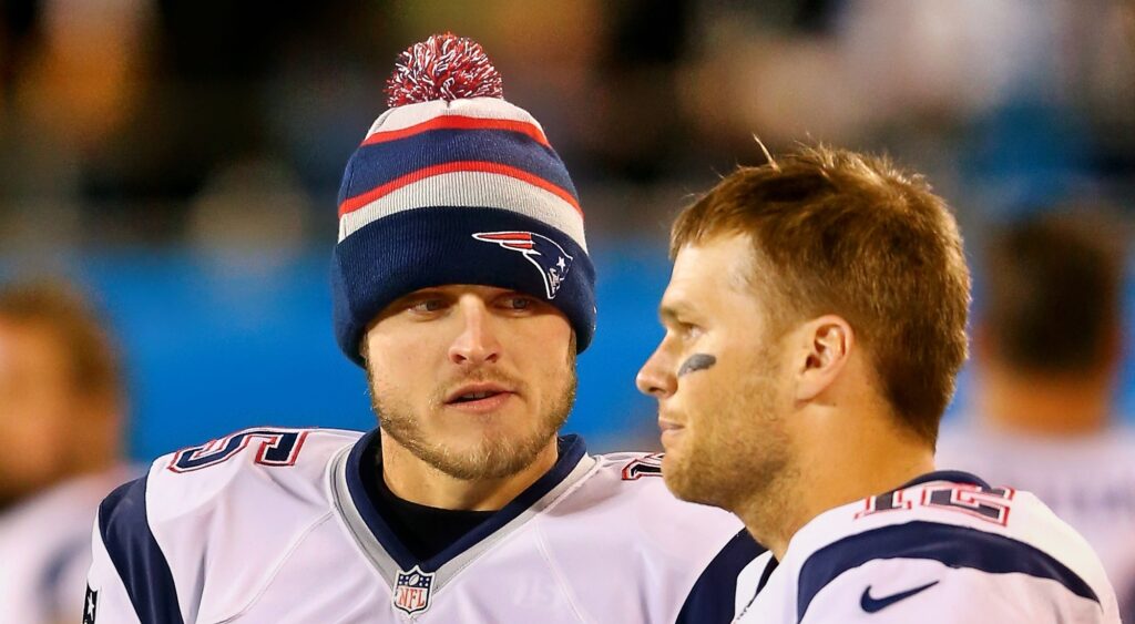 Ryan Mallett (left) talking to Tom Brady (right) of New England Patriots.