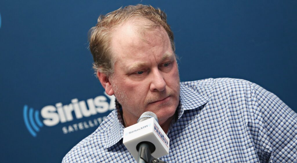 Curt Schilling in front of a microphone