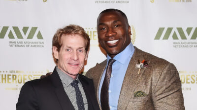 Shannon Sharpe posing with Skip Bayless