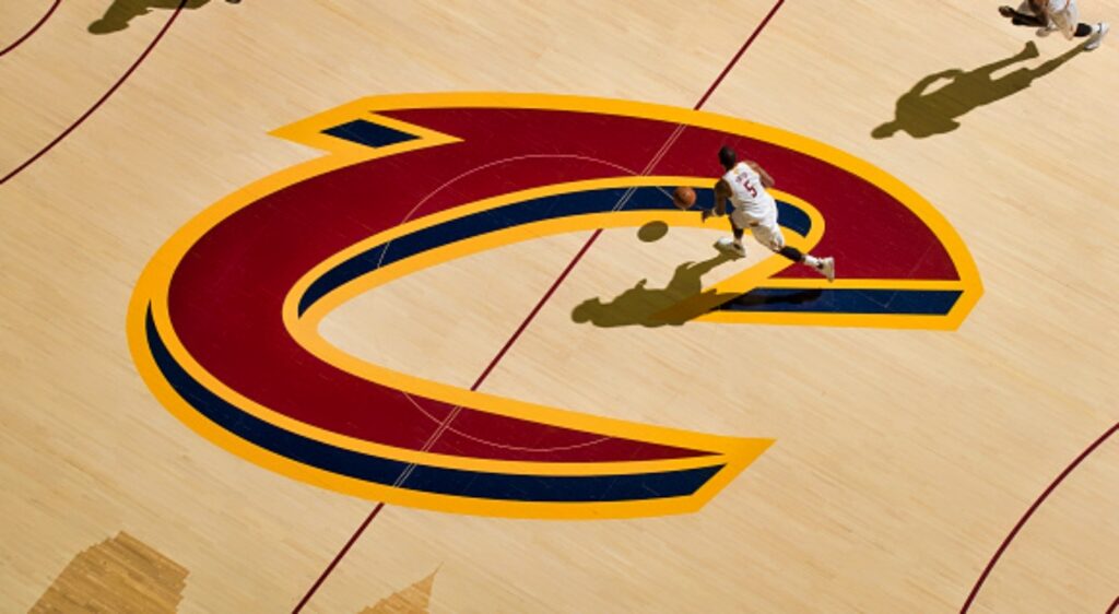The Cleveland Cavaliers logo at halfcourt during a game.