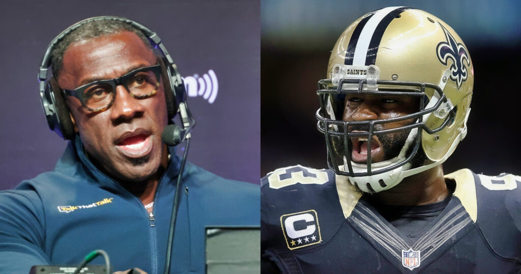 Shannon Sharpe with headset on. Junior Galette in uniform