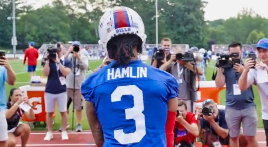 Damar Hamlin walks onto the field at Bills training camp.