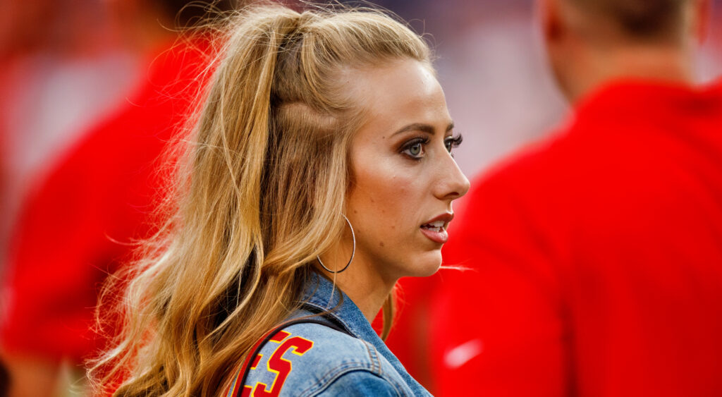 Brittany Mahomes looking on.