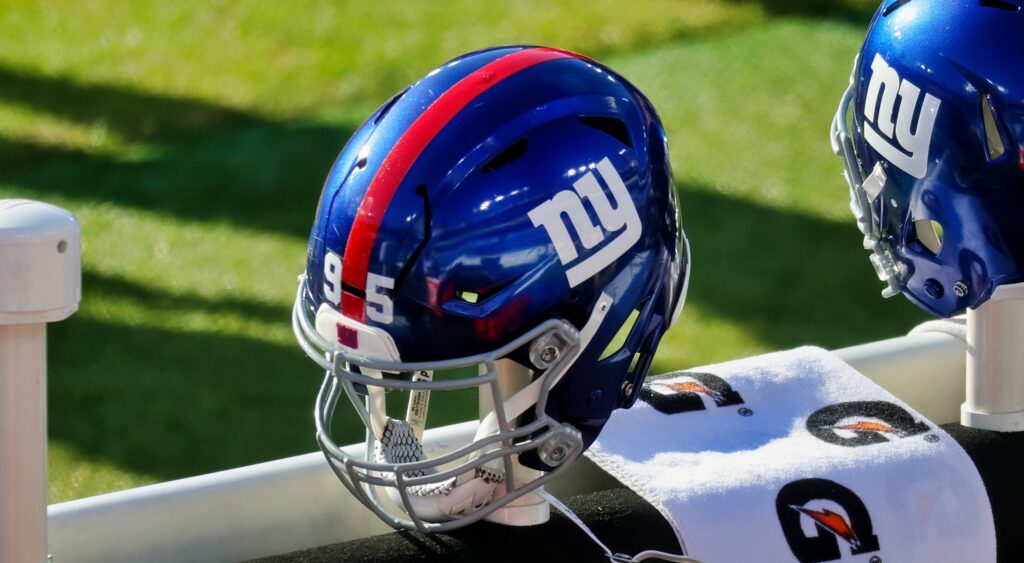 A New York Giants helmet on the sidelines.
