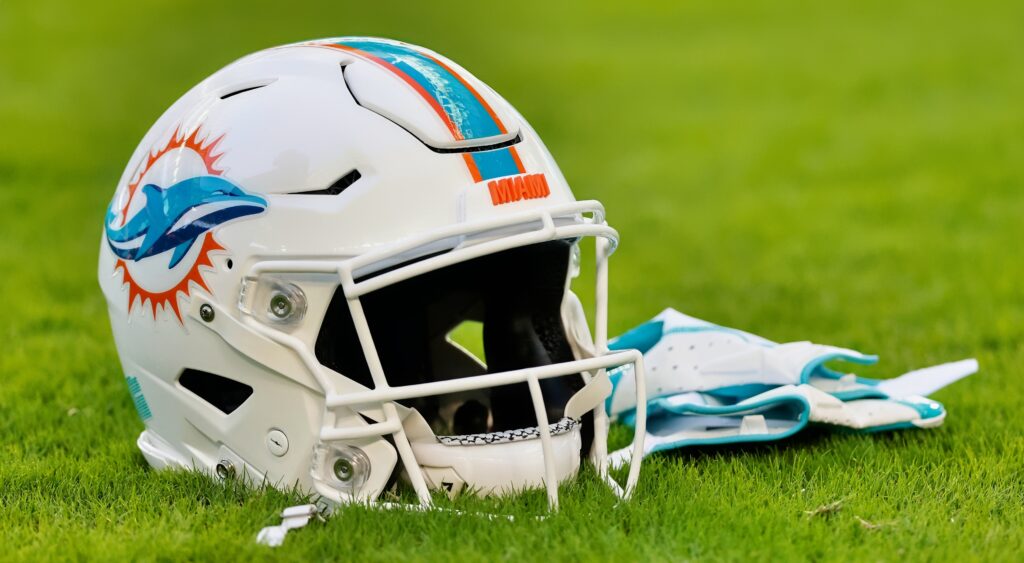 Miami Dolphins' helmet shown on field of Hard Rock Stadium.