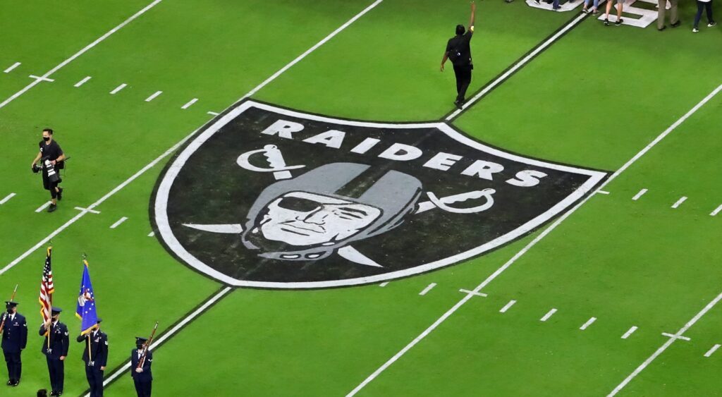 Raiders logo on the field.