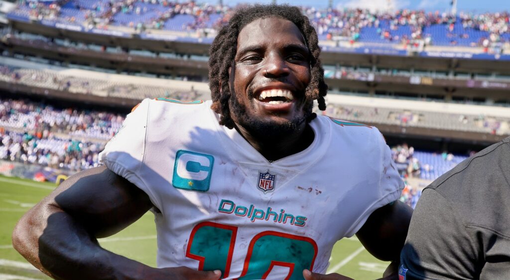 Tyreek Hill laughs after a game.