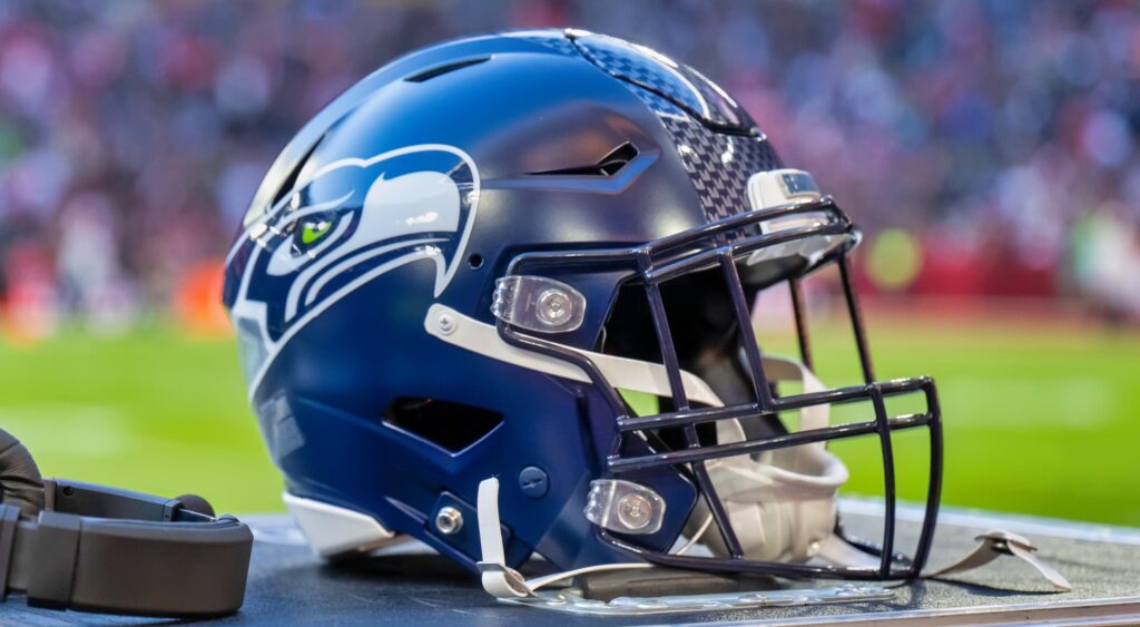 Seattle Seahawks helmet on the sideline table.