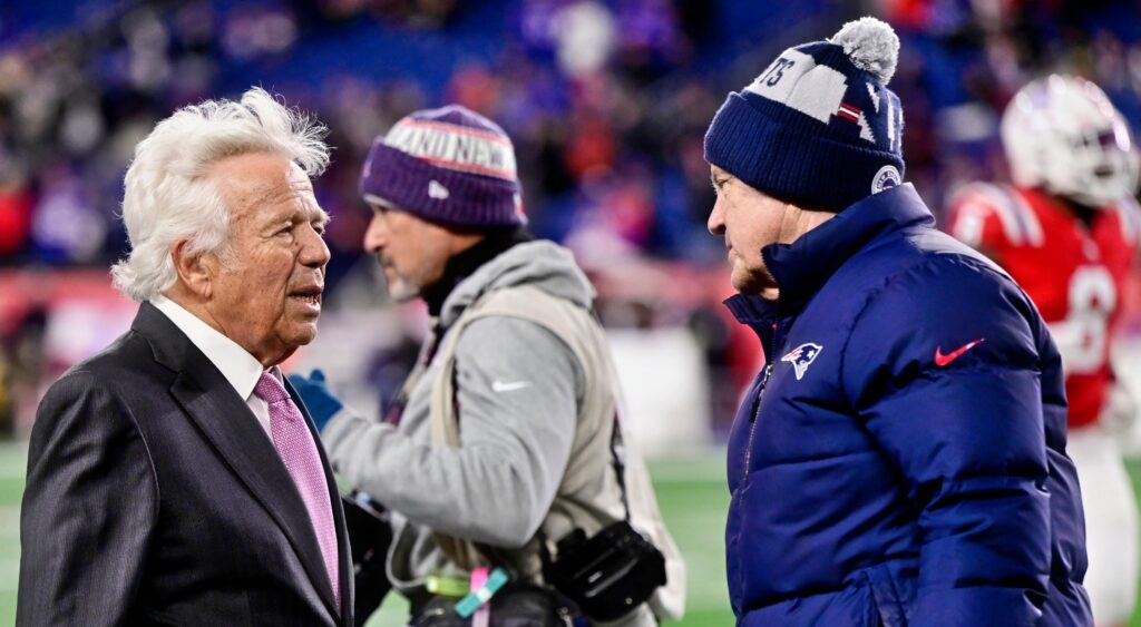 New England Patriots' owner Robert Craft (left) speaking to head coach Bill Belichick (right).