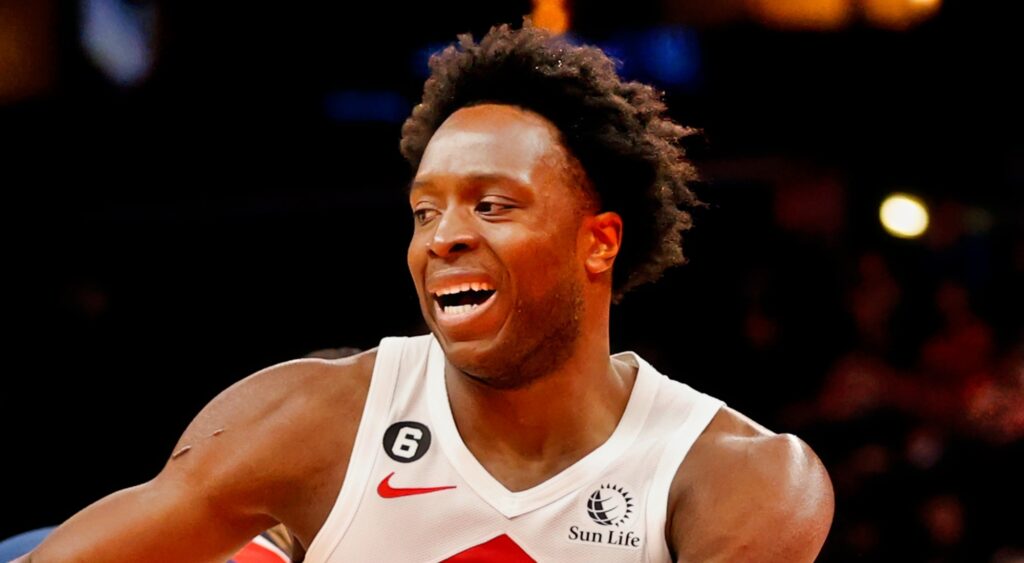 Toronto Raptors' star OG Anunoby looking on during game.