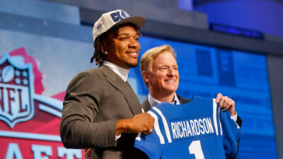 Anthony Richardson and Roger Goodell posing with his Colts jersey