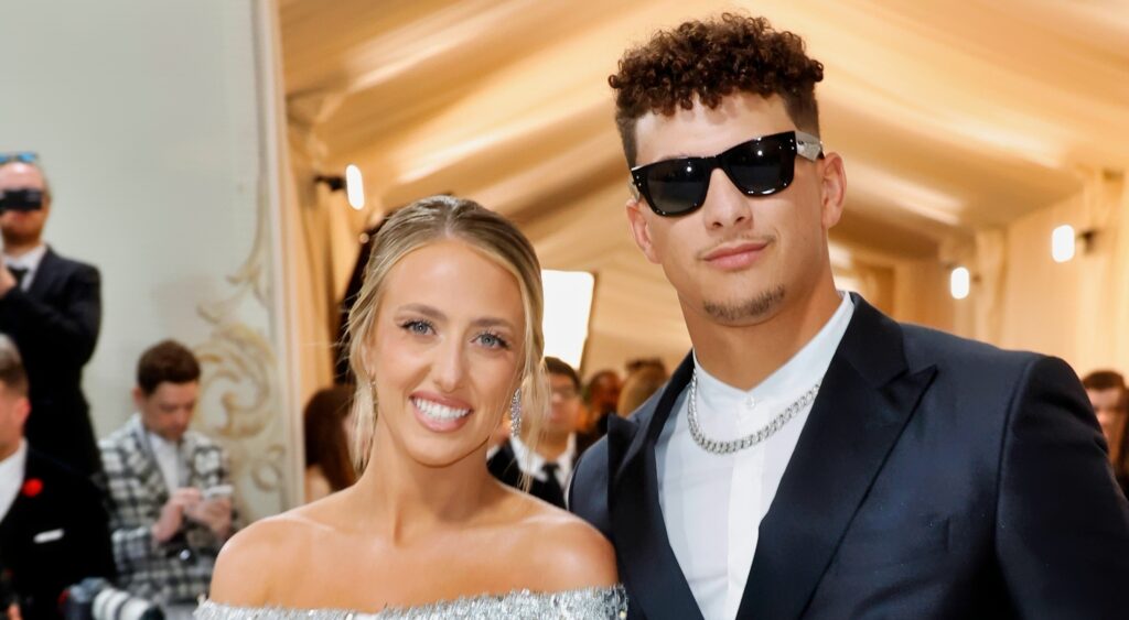 Brittany and Patrick Mahomes pose on the red carpet.