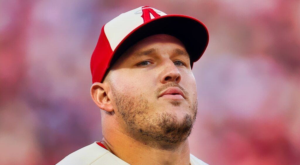Mike Trout of Los Angeles Angels looking on.