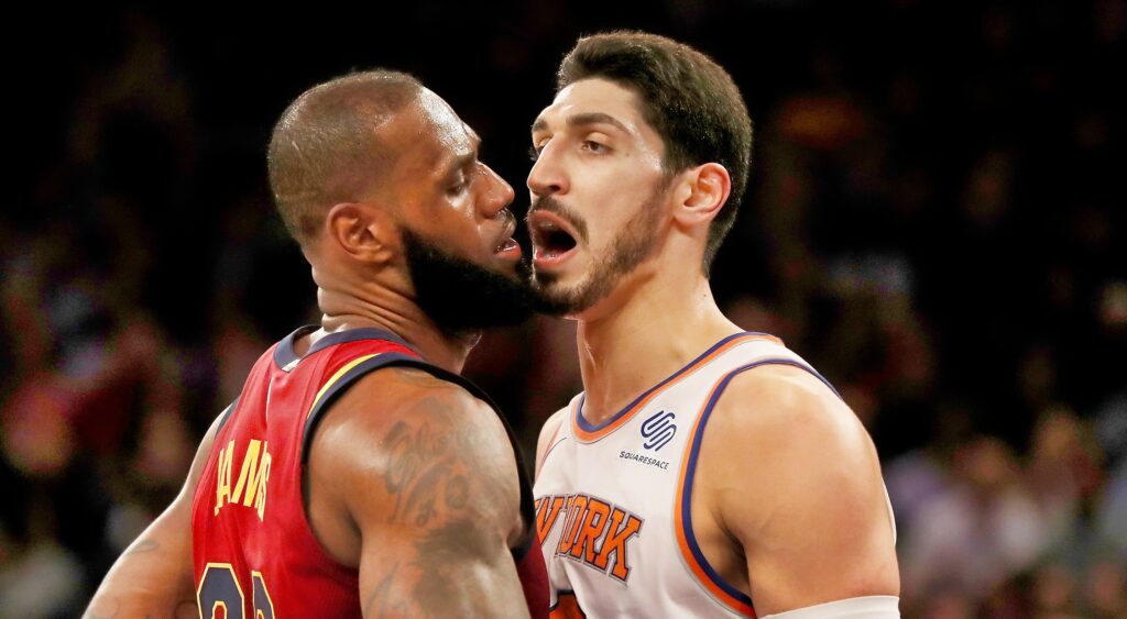 Enes Kanter talks in the face of LeBron James.