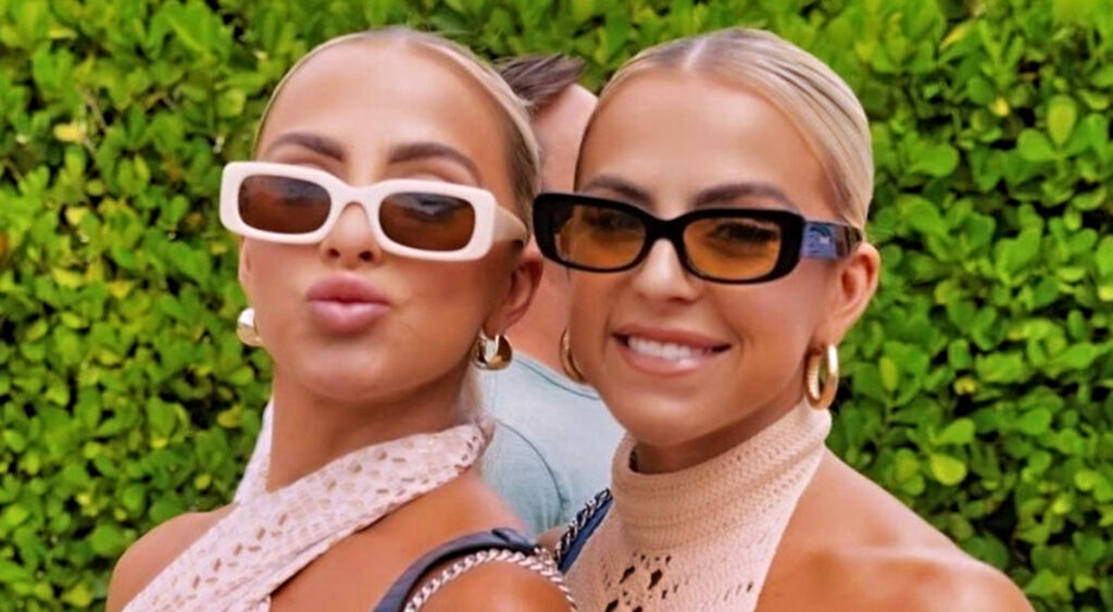 Cavinder twins smiling with sunglasses on.