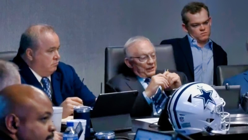 Jerry Jones and Dallas Cowboys' staffers in draft room.