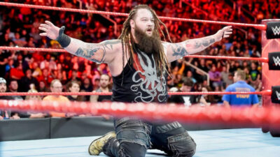 Bray Wyatt kneeling in wrestling ring