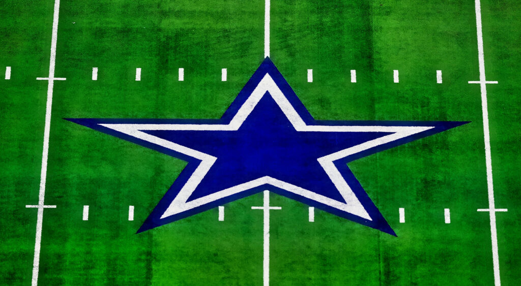 Dallas Cowboys logo midfield.