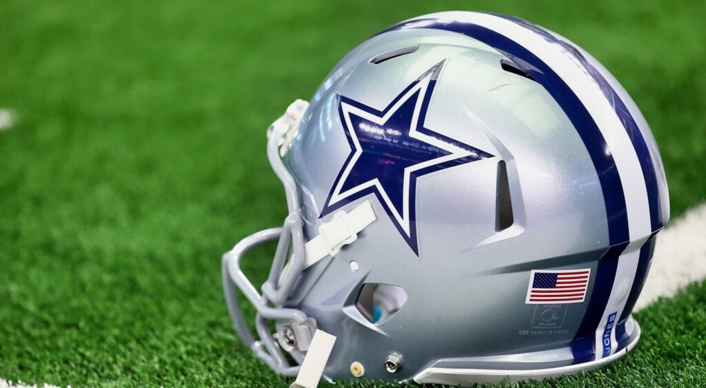 Dallas Cowboys' helmet shown on field.