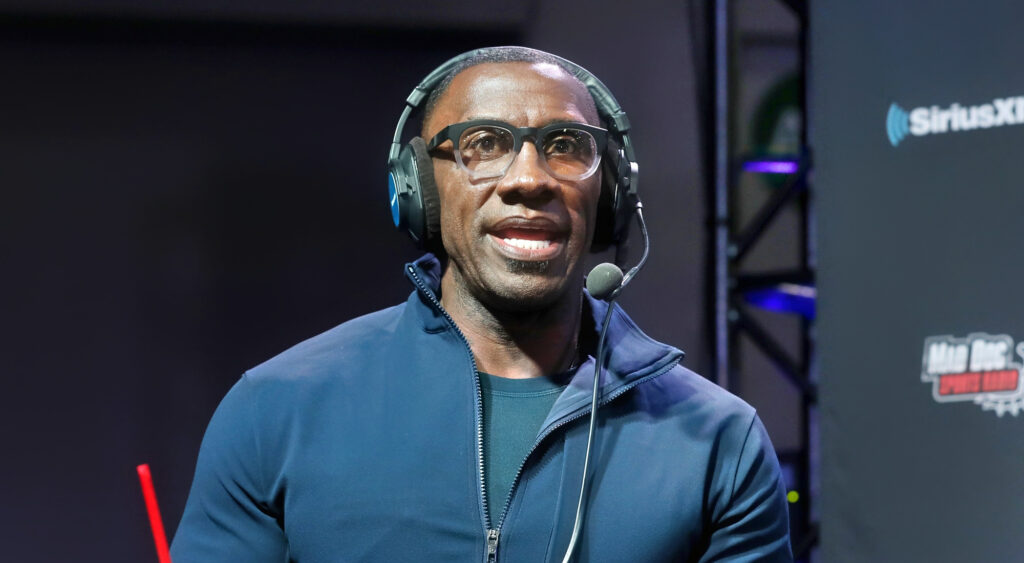 Shannon Sharpe speaking with headset on
