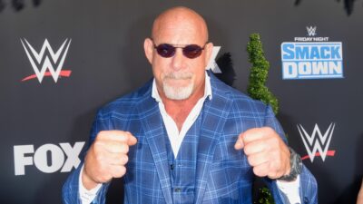 Bill Goldberg posing with WWE background