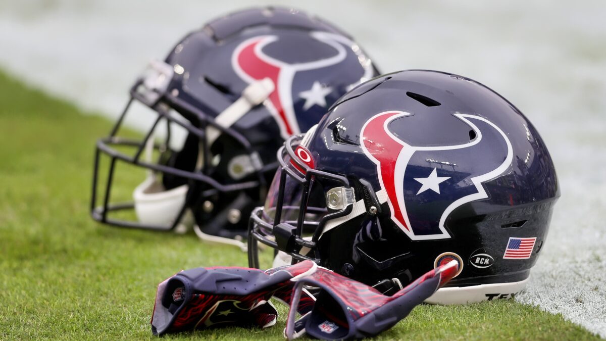 Texans helmets and gloves