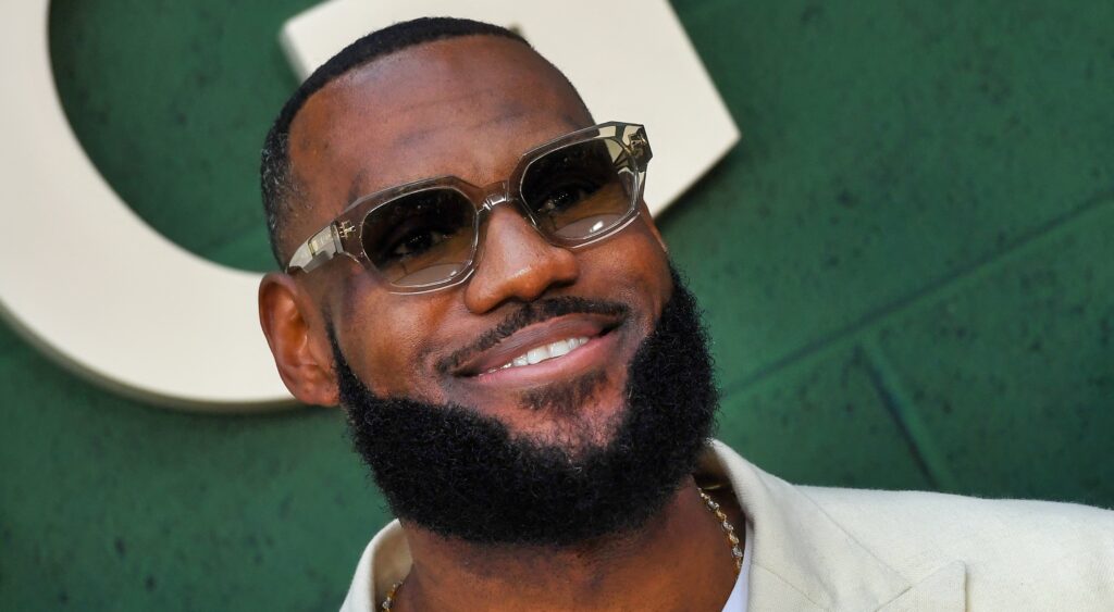 LeBron James posing in white suit